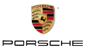 The image displays the Porsche logo featuring a gold shield with a black horse in the center, red and black stripes, and antlers. Below the shield, the word "Porsche" is written in bold, black, uppercase letters.